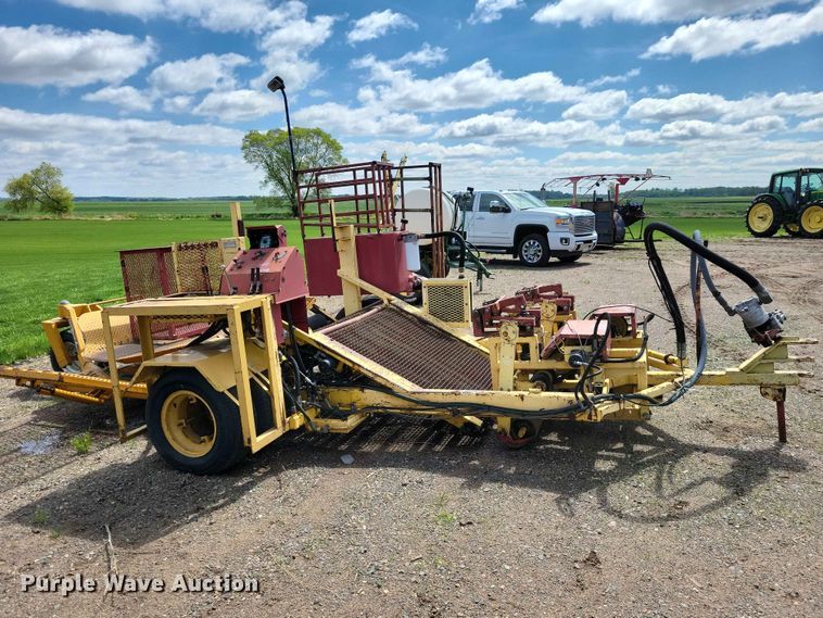 image for item DZ7157 Bucyrus Magnum 48 sod roll harvester
