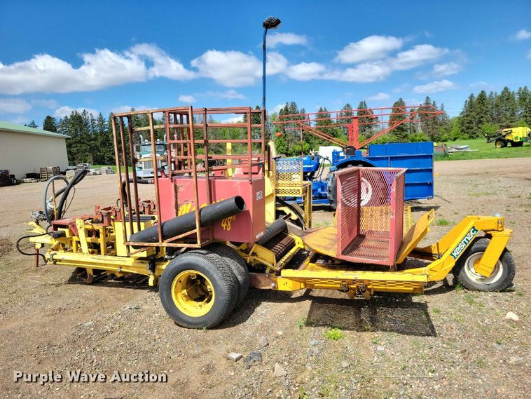 image for item DZ7157 Bucyrus Magnum 48 sod roll harvester