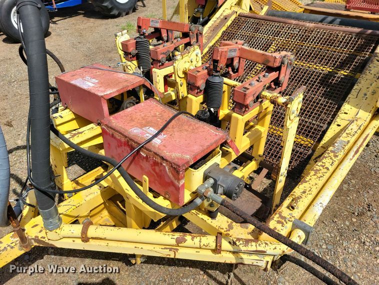 image for item DZ7157 Bucyrus Magnum 48 sod roll harvester