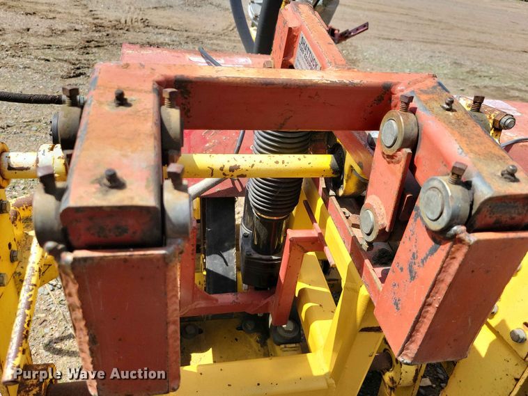 image for item DZ7157 Bucyrus Magnum 48 sod roll harvester