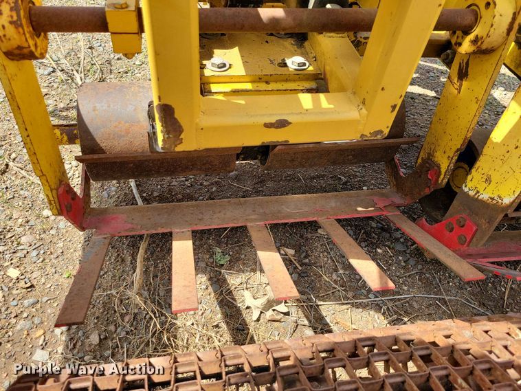 image for item DZ7157 Bucyrus Magnum 48 sod roll harvester