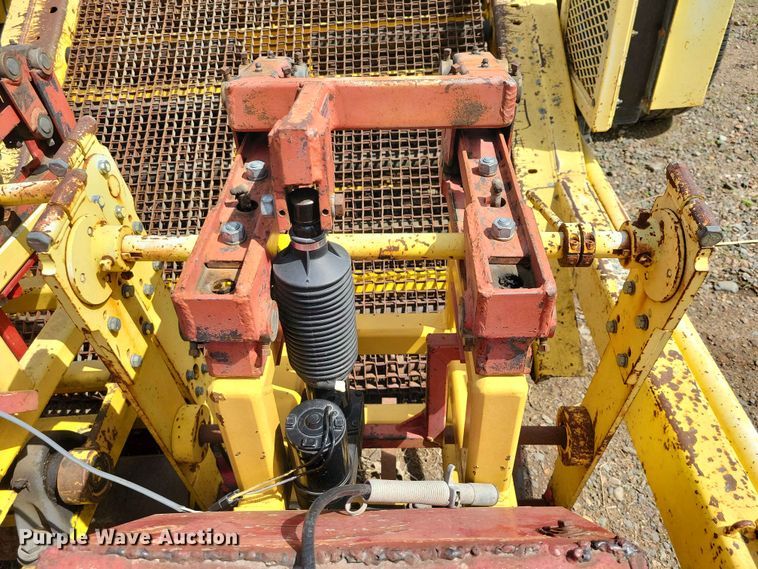 image for item DZ7157 Bucyrus Magnum 48 sod roll harvester