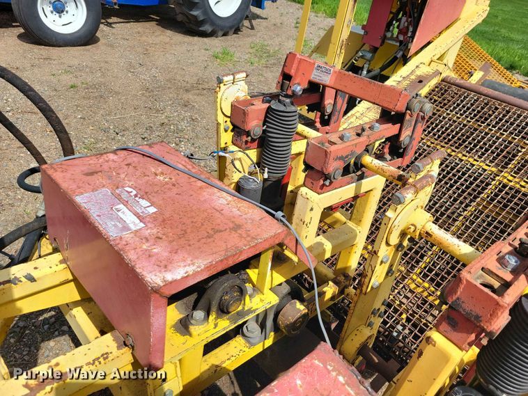 image for item DZ7157 Bucyrus Magnum 48 sod roll harvester