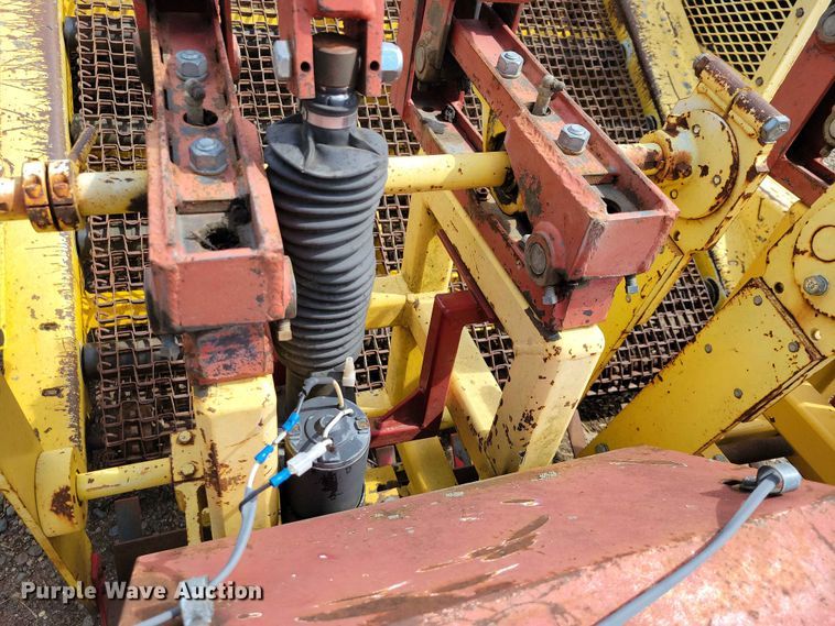 image for item DZ7157 Bucyrus Magnum 48 sod roll harvester