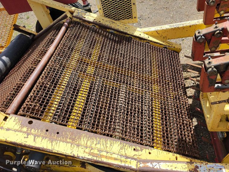 image for item DZ7157 Bucyrus Magnum 48 sod roll harvester