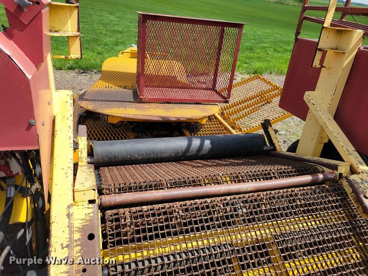 image for item DZ7157 Bucyrus Magnum 48 sod roll harvester