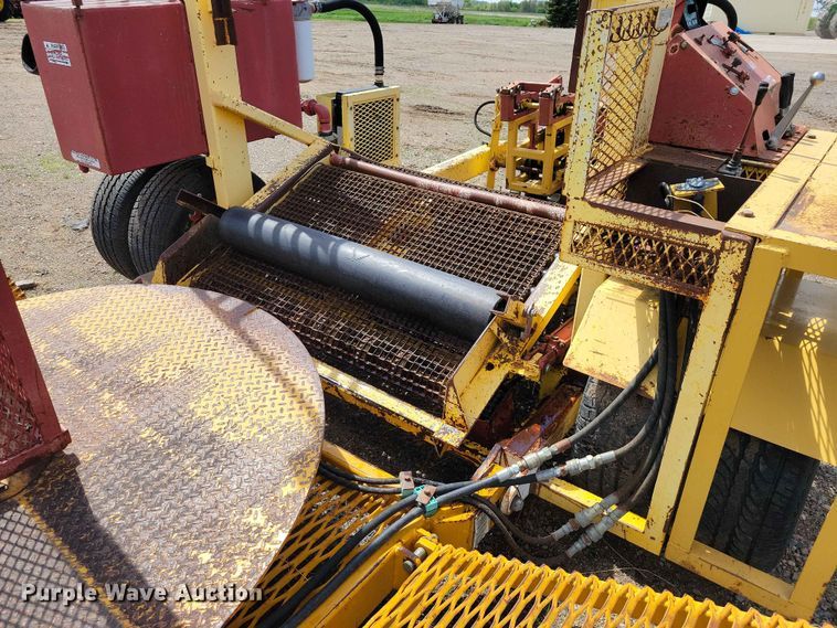 image for item DZ7157 Bucyrus Magnum 48 sod roll harvester