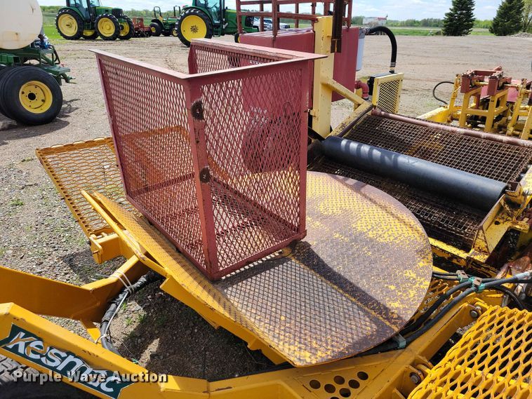 image for item DZ7157 Bucyrus Magnum 48 sod roll harvester