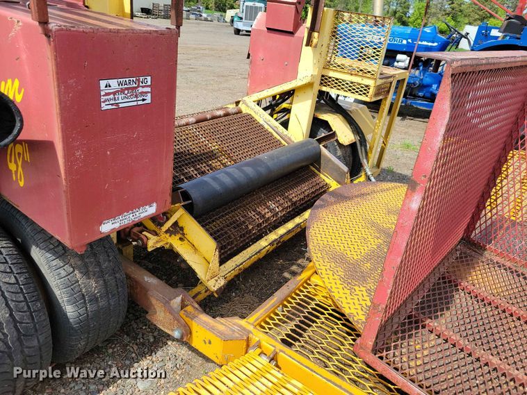 image for item DZ7157 Bucyrus Magnum 48 sod roll harvester