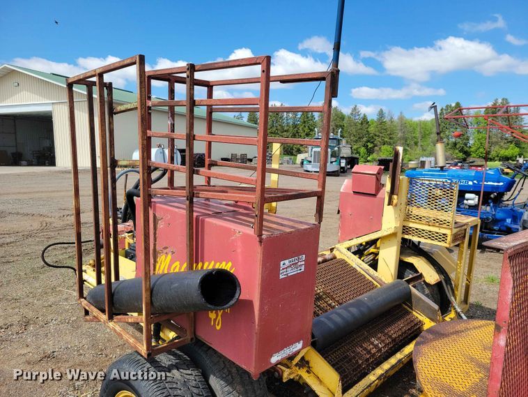 image for item DZ7157 Bucyrus Magnum 48 sod roll harvester