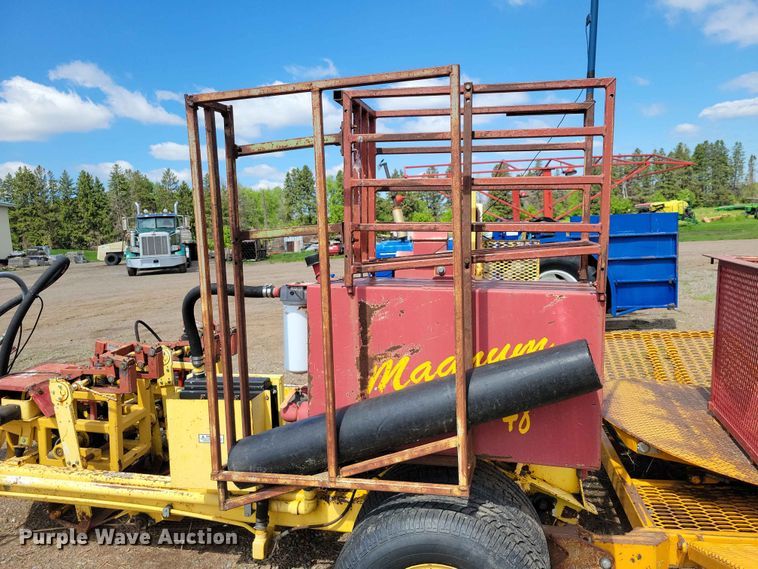 image for item DZ7157 Bucyrus Magnum 48 sod roll harvester