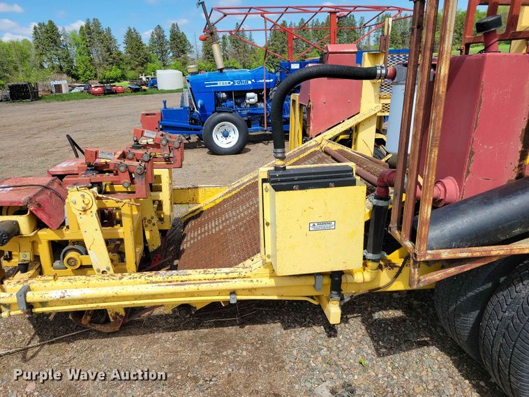 image for item DZ7157 Bucyrus Magnum 48 sod roll harvester