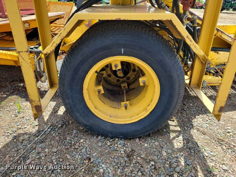 image for item DZ7157 Bucyrus Magnum 48 sod roll harvester