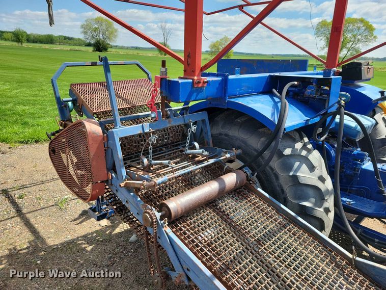 image for item DZ7158 1977 Ford 3600 tractor with Brouwer A3A sod harvester sod harvestor