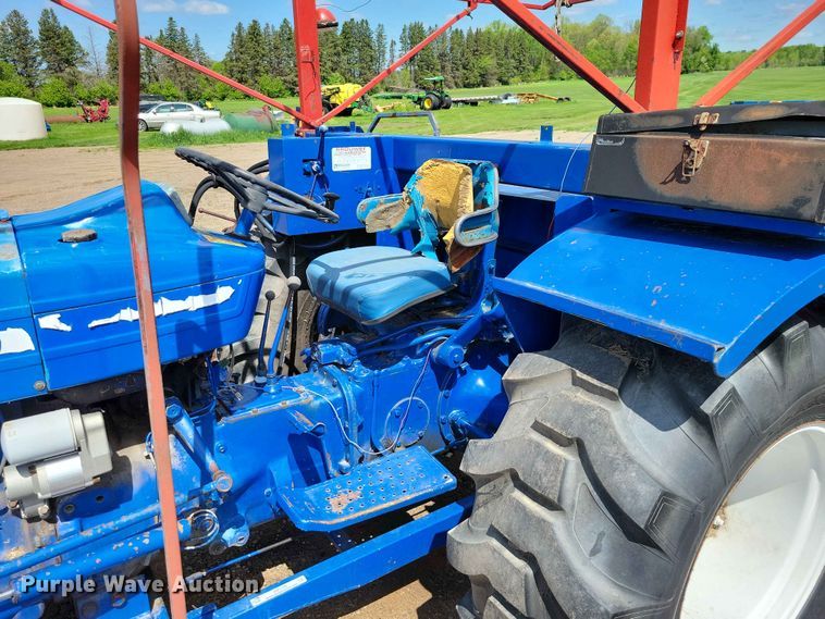 image for item DZ7158 1977 Ford 3600 tractor with Brouwer A3A sod harvester sod harvestor