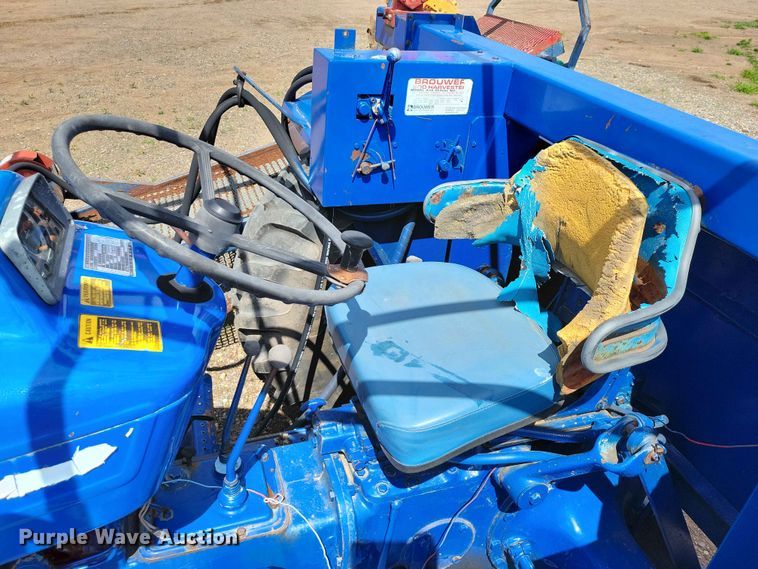 image for item DZ7158 1977 Ford 3600 tractor with Brouwer A3A sod harvester sod harvestor
