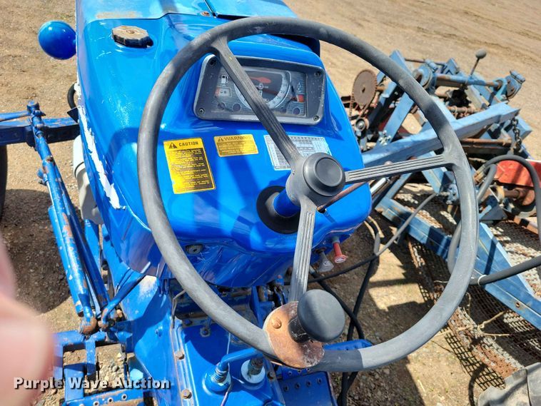 image for item DZ7158 1977 Ford 3600 tractor with Brouwer A3A sod harvester sod harvestor