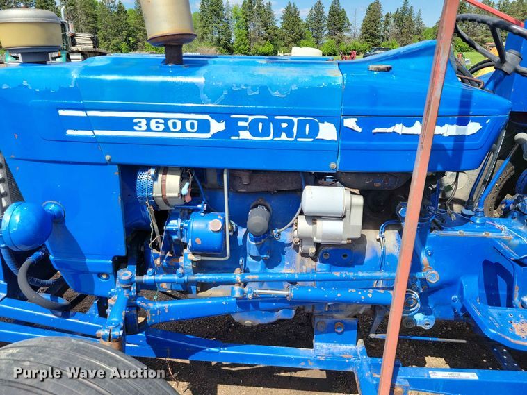 image for item DZ7158 1977 Ford 3600 tractor with Brouwer A3A sod harvester sod harvestor
