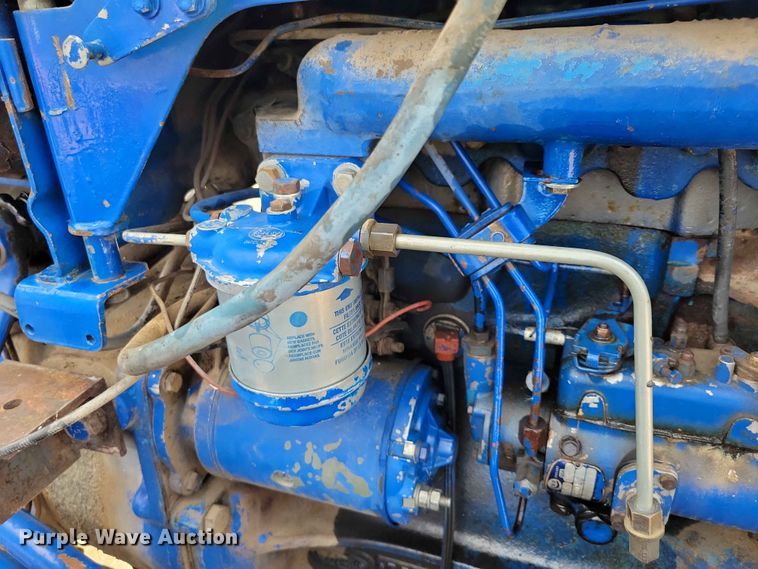 image for item DZ7158 1977 Ford 3600 tractor with Brouwer A3A sod harvester sod harvestor