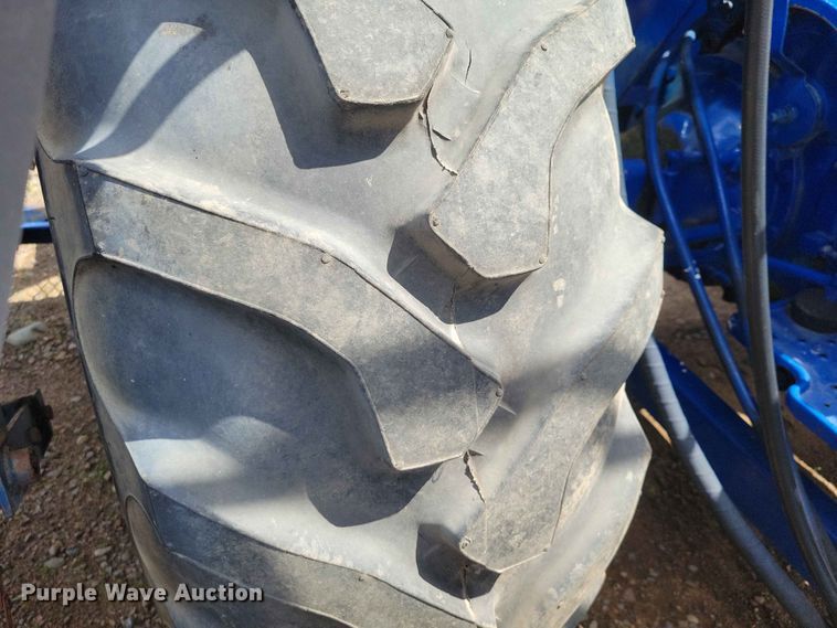 image for item DZ7158 1977 Ford 3600 tractor with Brouwer A3A sod harvester sod harvestor