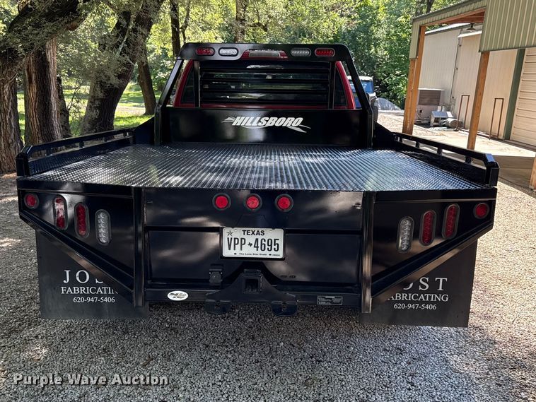 image for item EN0449 2001 Dodge Ram 3500 Ext. Cab flatbed pickup truck