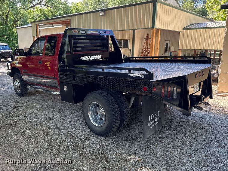 image for item EN0449 2001 Dodge Ram 3500 Ext. Cab flatbed pickup truck