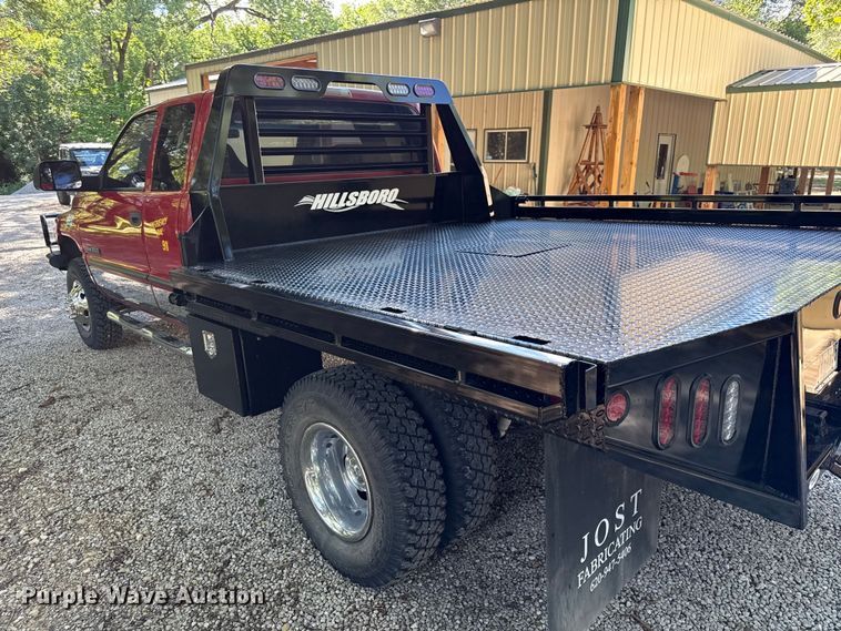 image for item EN0449 2001 Dodge Ram 3500 Ext. Cab flatbed pickup truck