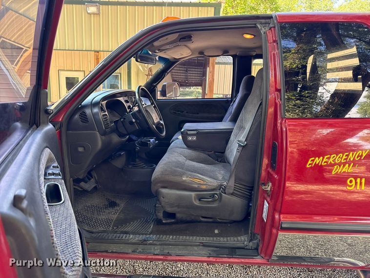 image for item EN0449 2001 Dodge Ram 3500 Ext. Cab flatbed pickup truck