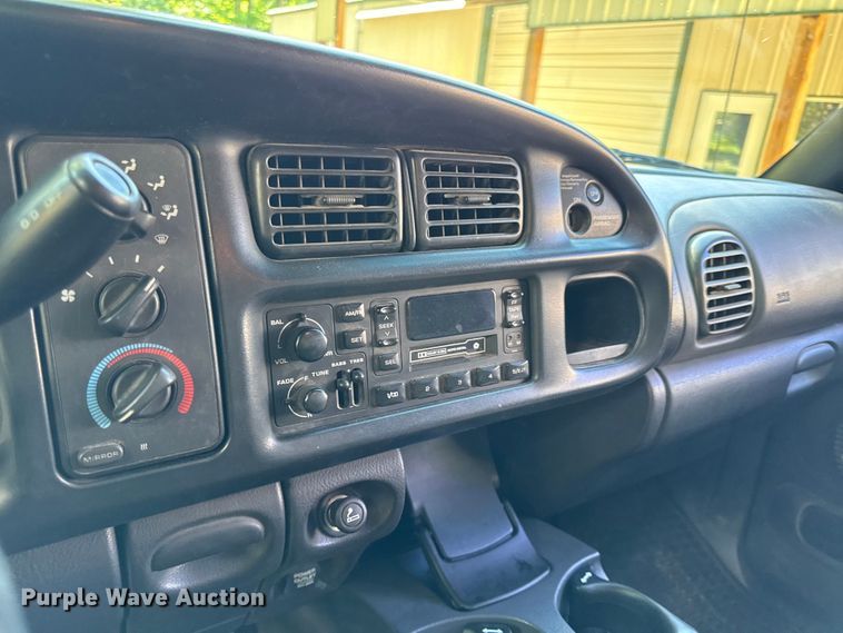 image for item EN0449 2001 Dodge Ram 3500 Ext. Cab flatbed pickup truck