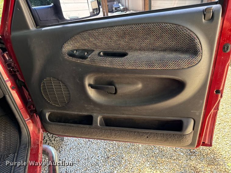 image for item EN0449 2001 Dodge Ram 3500 Ext. Cab flatbed pickup truck