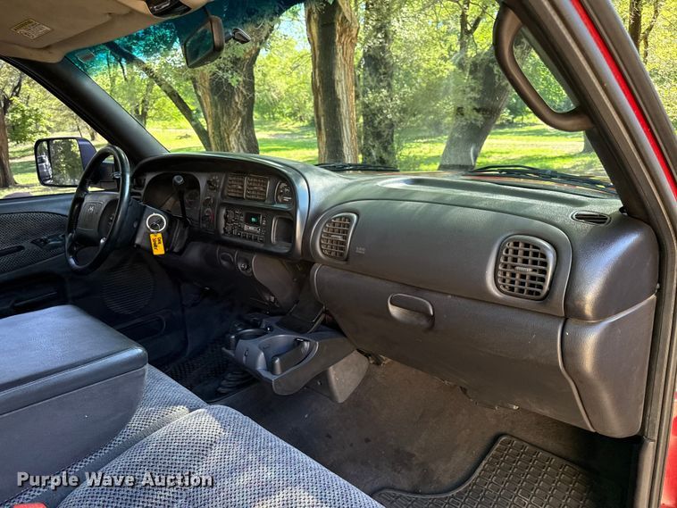 image for item EN0449 2001 Dodge Ram 3500 Ext. Cab flatbed pickup truck