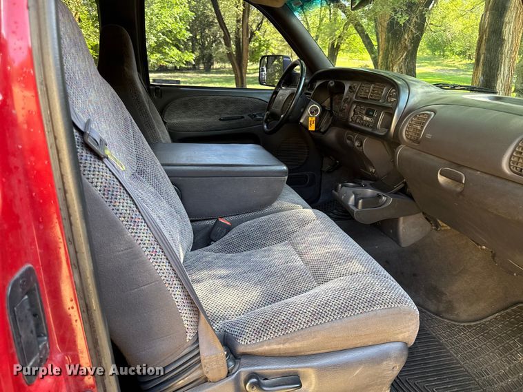 image for item EN0449 2001 Dodge Ram 3500 Ext. Cab flatbed pickup truck