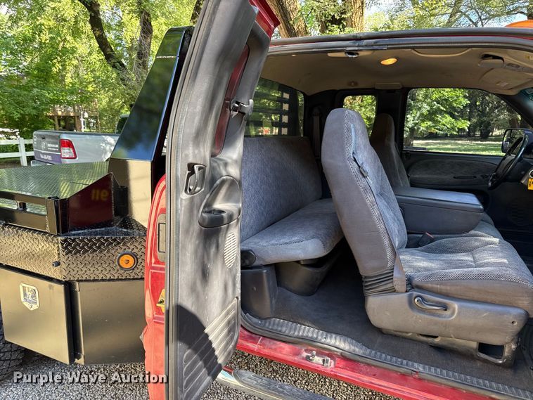 image for item EN0449 2001 Dodge Ram 3500 Ext. Cab flatbed pickup truck