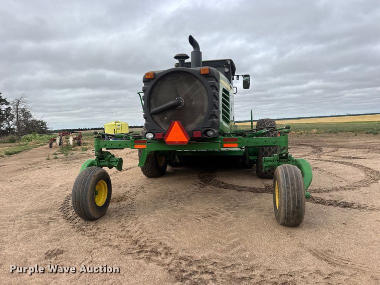 image for item NA9319 2013 John Deere R450 SP swather / windrower