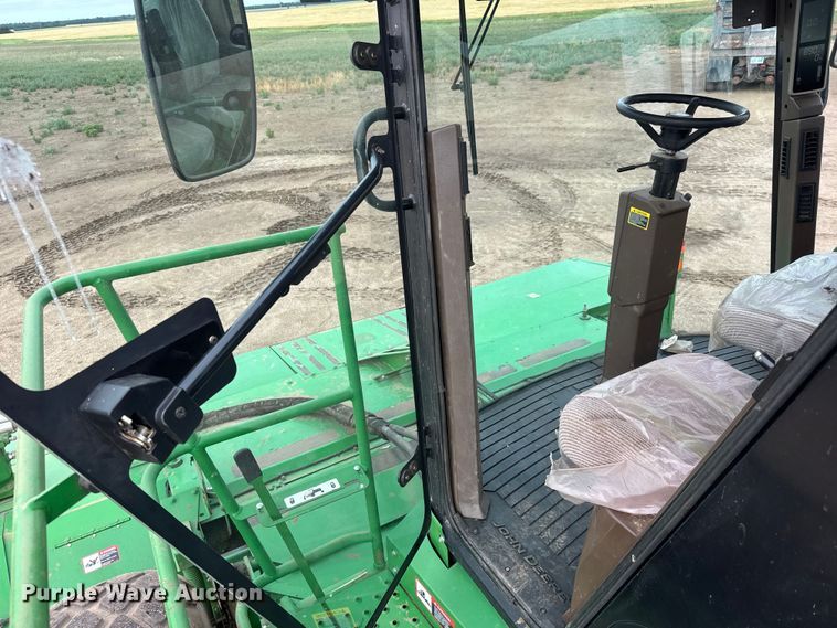 image for item NA9319 2013 John Deere R450 SP swather / windrower