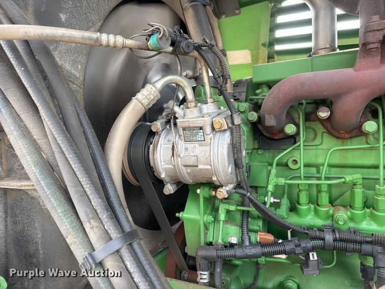image for item NA9319 2013 John Deere R450 SP swather / windrower