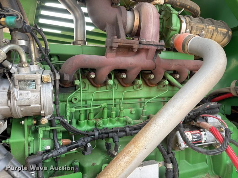 image for item NA9319 2013 John Deere R450 SP swather / windrower