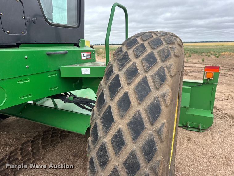 image for item NA9319 2013 John Deere R450 SP swather / windrower