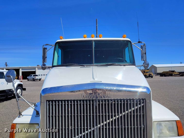 image for item ED0129 1993 White GMC WIA semi truck