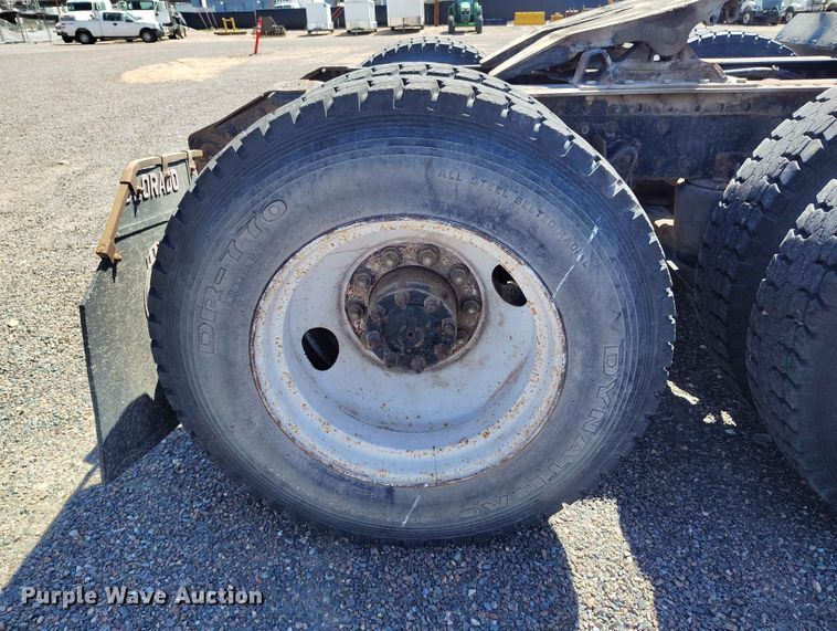 image for item ED0129 1993 White GMC WIA semi truck