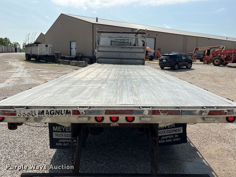 image for item EU0620 2009 Volvo VNM dump flatbed truck