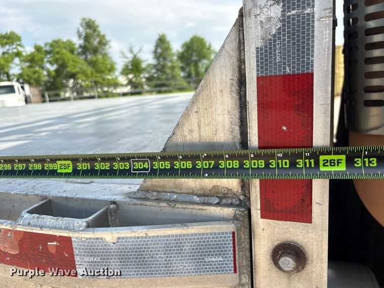 image for item EU0620 2009 Volvo VNM dump flatbed truck