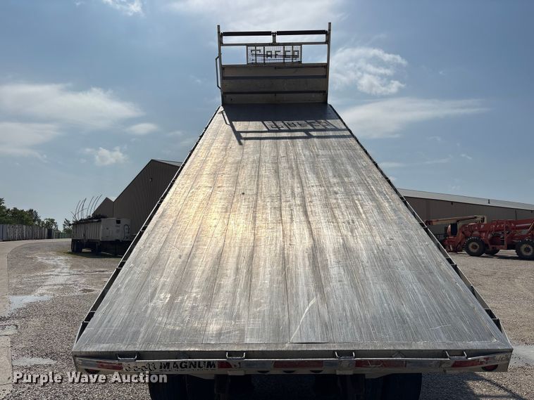 image for item EU0620 2009 Volvo VNM dump flatbed truck