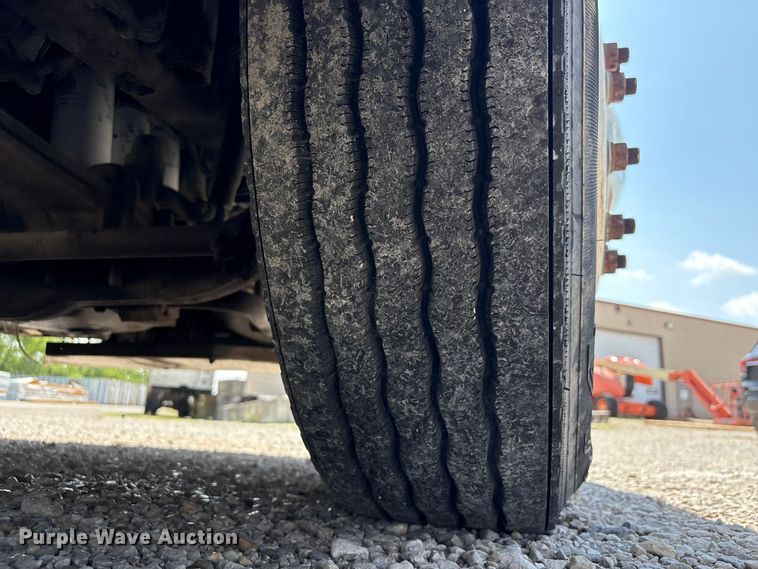 image for item EU0620 2009 Volvo VNM dump flatbed truck