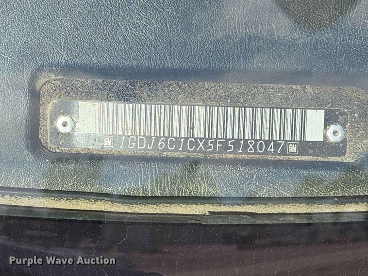 image for item DP8936 2005 GMC C6500 dump flatbed truck