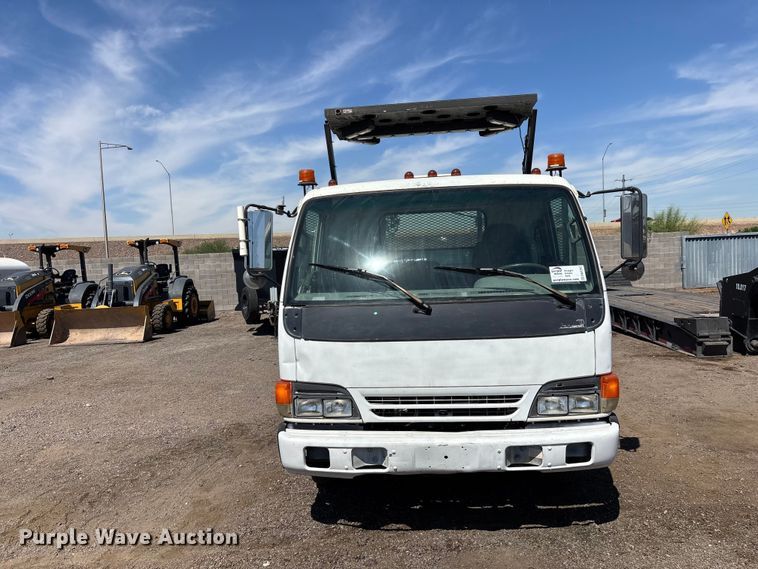 image for item DW1297 1999 Isuzu NPR flatbed truck