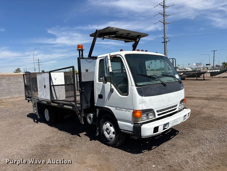 image for item DW1297 1999 Isuzu NPR flatbed truck