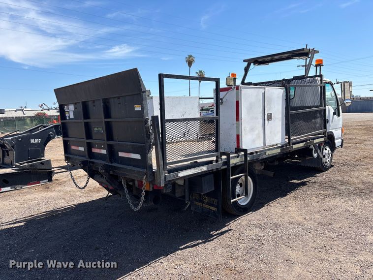 image for item DW1297 1999 Isuzu NPR flatbed truck