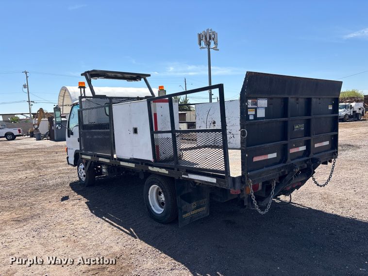 image for item DW1297 1999 Isuzu NPR flatbed truck