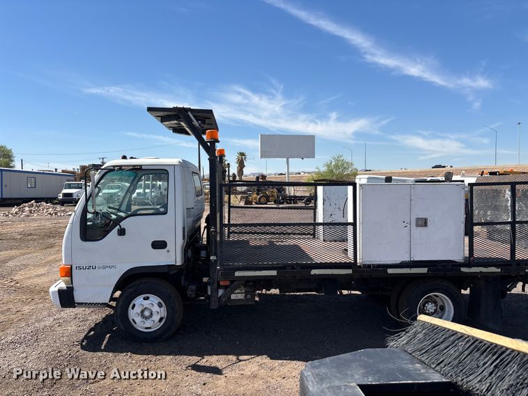 image for item DW1297 1999 Isuzu NPR flatbed truck